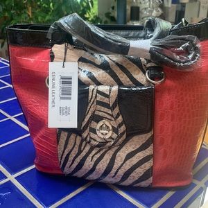 NWT Madi Claire supple leather bag with zebra print.